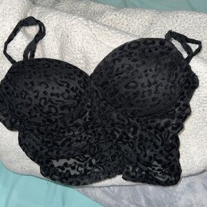 good condition, size S, is black and has prints